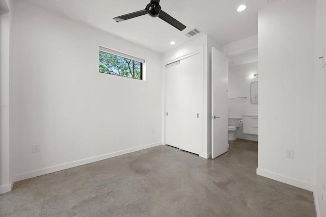 unfurnished bedroom with recessed lighting, baseboards, concrete floors, and visible vents