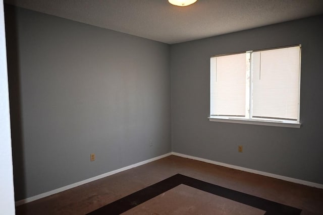 817 Lexington Rd, Elgin, TX 78621 - unfurnished room featuring a textured ceiling and baseboards