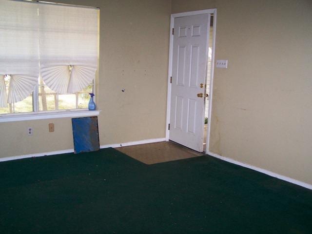 817 Lexington Rd, Elgin, TX 78621 - empty room featuring baseboards