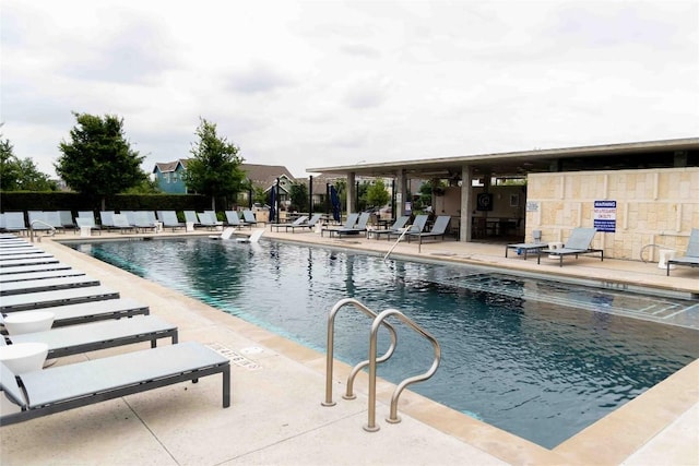 9015 Cattle Baron Path Unit 504, Austin, TX 78747 - community pool featuring a patio area