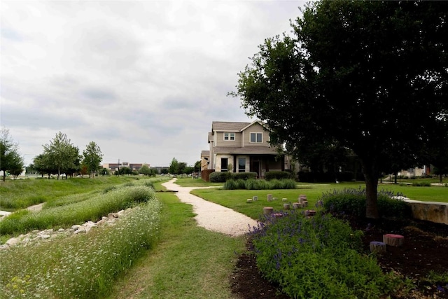 9015 Cattle Baron Path Unit 504, Austin, TX 78747 - surrounding community featuring a lawn