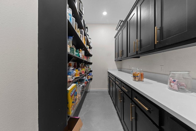 7143 Kc Ranch Ct, Temple, TX 76501 - bar featuring baseboards, recessed lighting, and finished concrete flooring