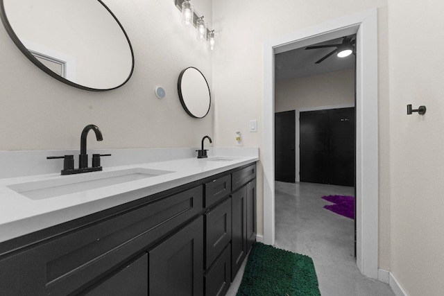 7143 Kc Ranch Ct, Temple, TX 76501 - full bath with double vanity, a sink, and baseboards