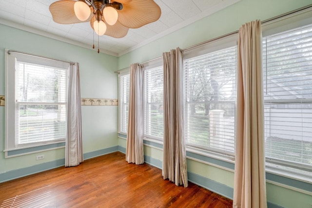 700 S Walnut Ave, Luling, TX 78648 - empty room featuring a ceiling fan and wood finished floors