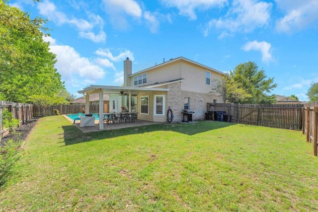 1515 Kothman Dr, Hutto, TX 78634 - rear view of property featuring ceiling fan, a chimney, and a patio