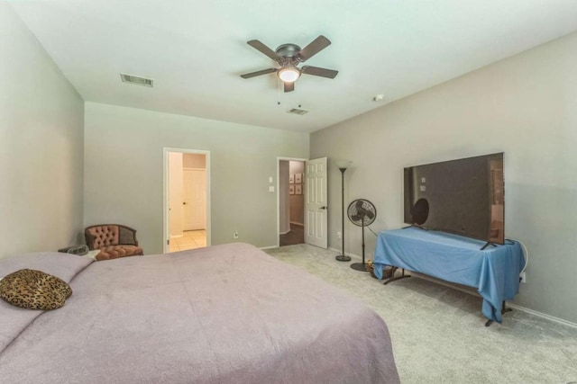 1515 Kothman Dr, Hutto, TX 78634 - bedroom with carpet floors, ceiling fan, and baseboards