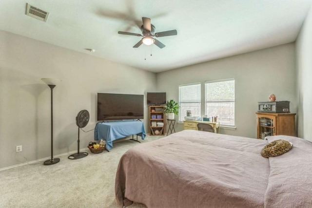 1515 Kothman Dr, Hutto, TX 78634 - bedroom with carpet floors, baseboards, and a ceiling fan