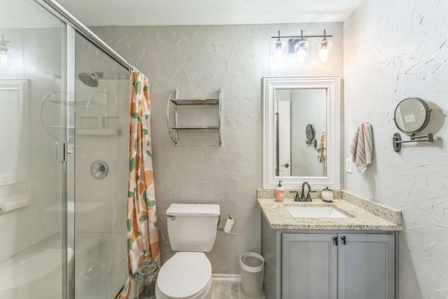 1515 Kothman Dr, Hutto, TX 78634 - bathroom featuring a shower with curtain, vanity, toilet, and a textured wall