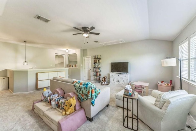 1515 Kothman Dr, Hutto, TX 78634 - living room with attic access, ceiling fan, carpet floors, and vaulted ceiling