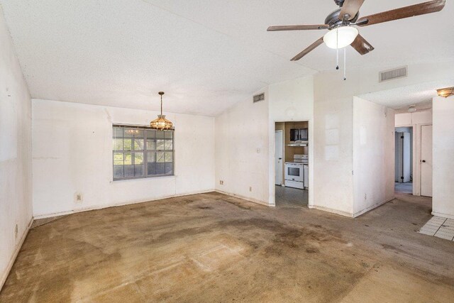 810 San Jacinto St, Lockhart, TX 78644 - carpeted empty room with ceiling fan and vaulted ceiling