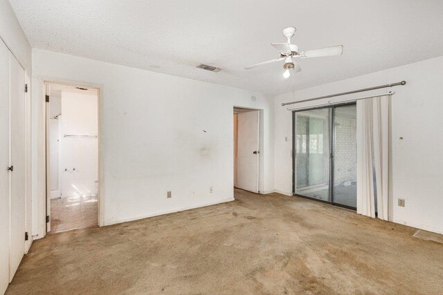 810 San Jacinto St, Lockhart, TX 78644 - spare room with carpet flooring and ceiling fan