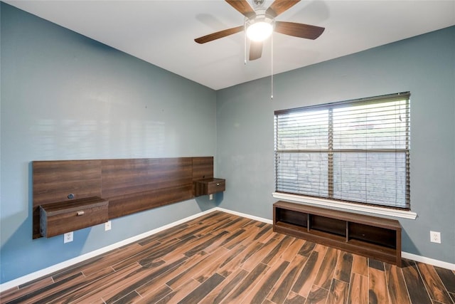 6000 Shepherd Mountain Cv Unit 407, Austin, TX 78730 - unfurnished room featuring wood finished floors, baseboards, and ceiling fan