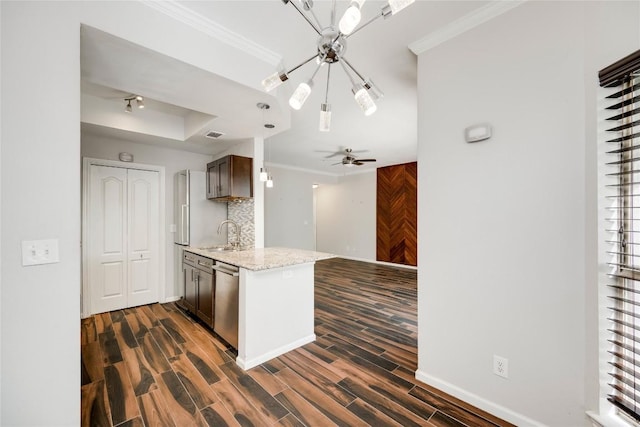 6000 Shepherd Mountain Cv Unit 407, Austin, TX 78730 - kitchen with dishwasher, a sink, a tray ceiling, ornamental molding, and dark wood finished floors