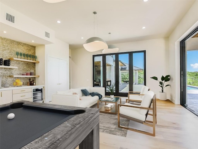 4800 Mondonedo Cv, Austin, TX 78738 - rec room featuring a bar, beverage cooler, recessed lighting, light wood-type flooring, and billiards