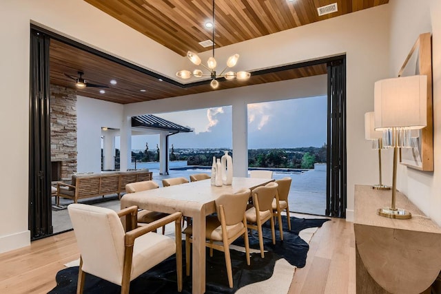 4800 Mondonedo Cv, Austin, TX 78738 - dining space featuring wood ceiling, a chandelier, light wood finished floors, and recessed lighting