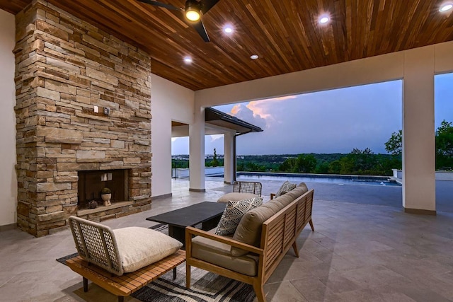 4800 Mondonedo Cv, Austin, TX 78738 - view of patio featuring an outdoor living space with a fireplace