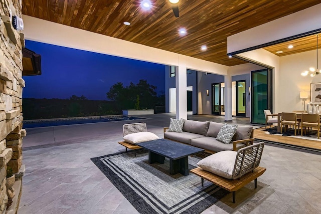 4800 Mondonedo Cv, Austin, TX 78738 - patio at night with a patio, outdoor lounge area, and outdoor dining space