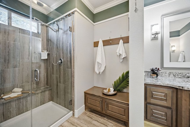 5200 Patagonia Pass, Austin, TX 78738 - bathroom featuring crown molding, a stall shower, vanity, and wood finished floors