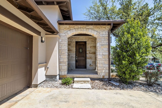 5200 Patagonia Pass, Austin, TX 78738 - property entrance featuring stone siding and stucco siding