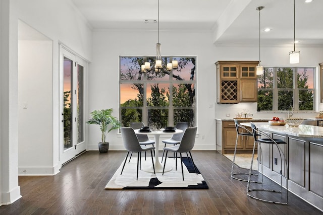5200 Patagonia Pass, Austin, TX 78738 - dining room featuring a chandelier, ornamental molding, recessed lighting, and dark wood finished floors