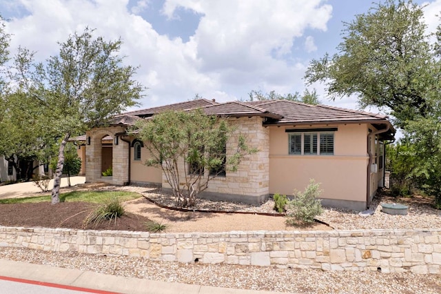 5200 Patagonia Pass, Austin, TX 78738 - view of front of home featuring stone siding, stucco siding, and a tiled roof
