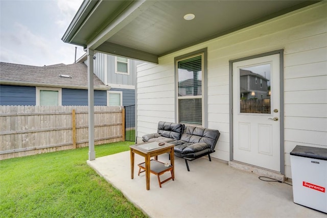 view of patio with outdoor lounge area and fence
