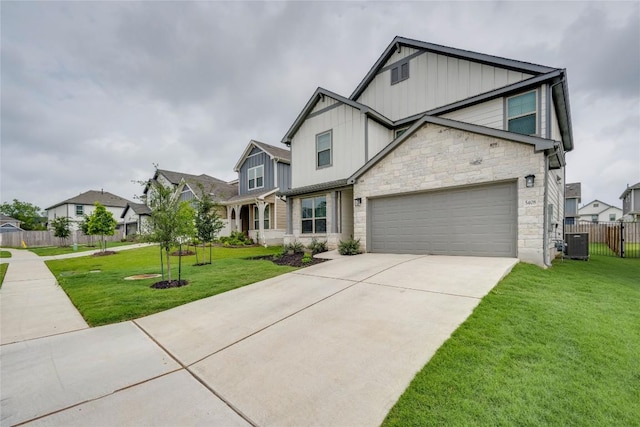 5408 Mars Ln, Austin, TX 78724 - view of front of house featuring board and batten siding, stone siding, central AC, and concrete driveway