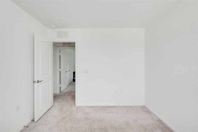5408 Mars Ln, Austin, TX 78724 - carpeted empty room featuring baseboards and a smoke detector