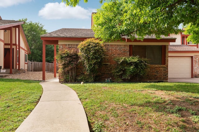 8902 Trone Cir Unit A, Austin, TX 78758 - view of front of property featuring brick siding and an attached garage