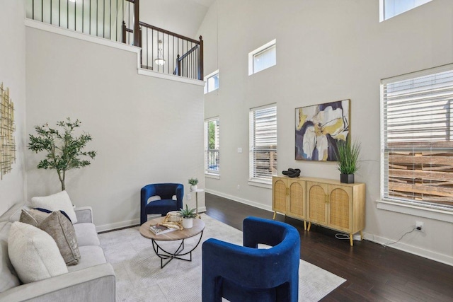 2001 Faro Dr Unit 29, Austin, TX 78741 - living area with baseboards, a high ceiling, and wood finished floors