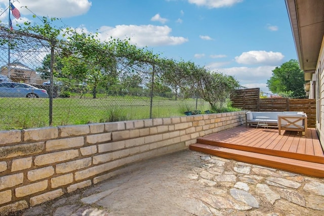 2001 Faro Dr Unit 29, Austin, TX 78741 - view of patio / terrace with a fenced backyard and a wooden deck