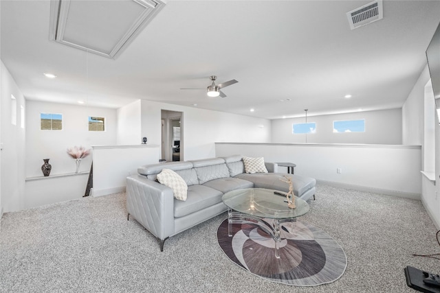 18005 Umberto Dr, Pflugerville, TX 78660 - living area with attic access, carpet floors, recessed lighting, and ceiling fan