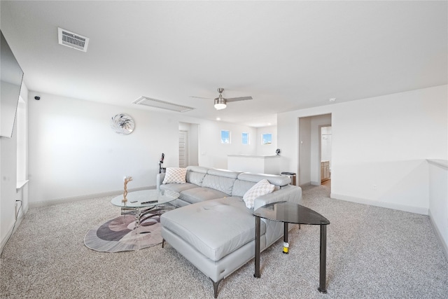 18005 Umberto Dr, Pflugerville, TX 78660 - living room with carpet, a ceiling fan, and baseboards