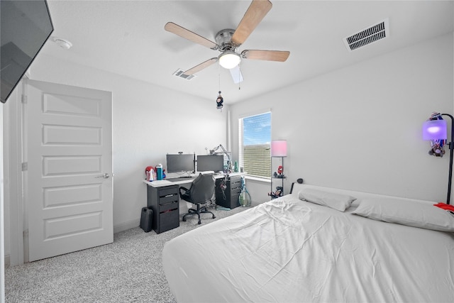 18005 Umberto Dr, Pflugerville, TX 78660 - carpeted bedroom with a desk, ceiling fan, and baseboards