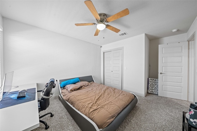 18005 Umberto Dr, Pflugerville, TX 78660 - carpeted bedroom featuring a desk, a ceiling fan, and a closet