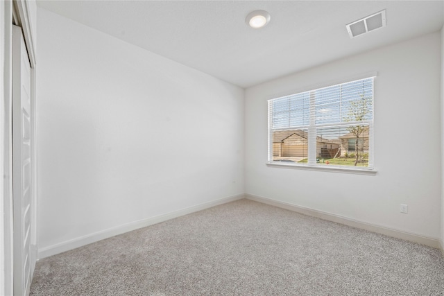 18005 Umberto Dr, Pflugerville, TX 78660 - empty room featuring carpet and baseboards