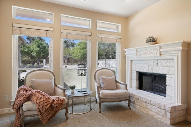 1310 Ventana Cyn, Leander, TX 78641 - living area with carpet flooring and a stone fireplace