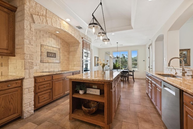 1310 Ventana Cyn, Leander, TX 78641 - kitchen featuring stainless steel appliances, brown cabinetry, open shelves, light stone counters, and hanging light fixtures