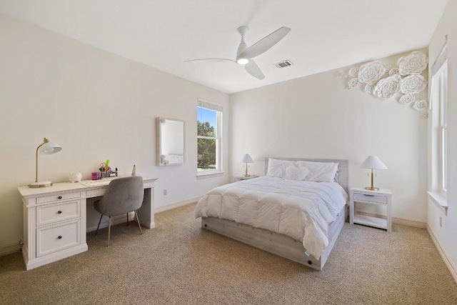1310 Ventana Cyn, Leander, TX 78641 - bedroom with light colored carpet, a desk, and a ceiling fan