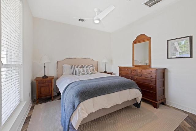 1310 Ventana Cyn, Leander, TX 78641 - bedroom featuring wood finished floors and a ceiling fan