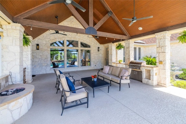 1310 Ventana Cyn, Leander, TX 78641 - view of patio featuring ceiling fan, exterior kitchen, and an outdoor living space