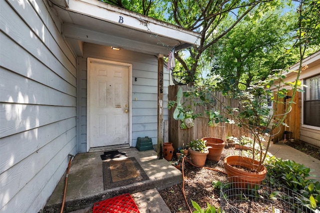 property entrance featuring fence