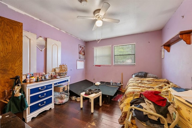 bedroom featuring ceiling fan and hardwood / wood-style floors