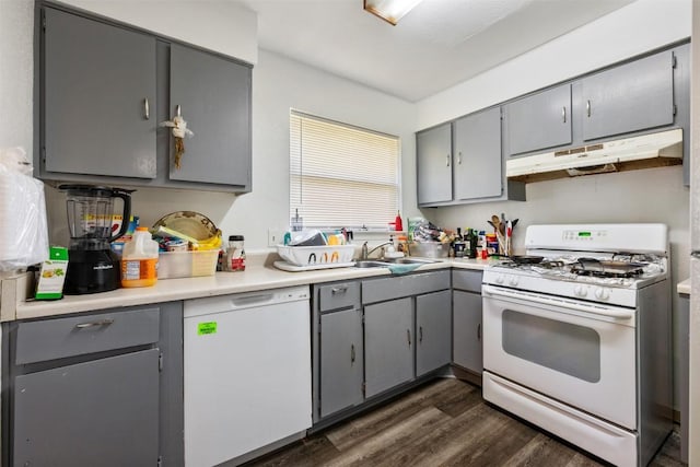 825 Ken St, Austin, TX 78758 - kitchen with a sink, gray cabinets, under cabinet range hood, and white appliances