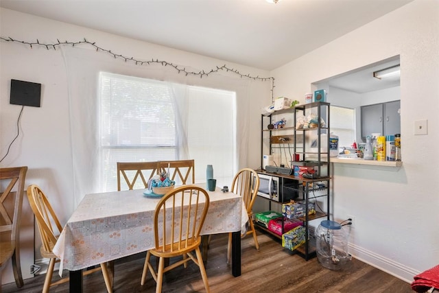 825 Ken St, Austin, TX 78758 - dining space with baseboards and wood finished floors