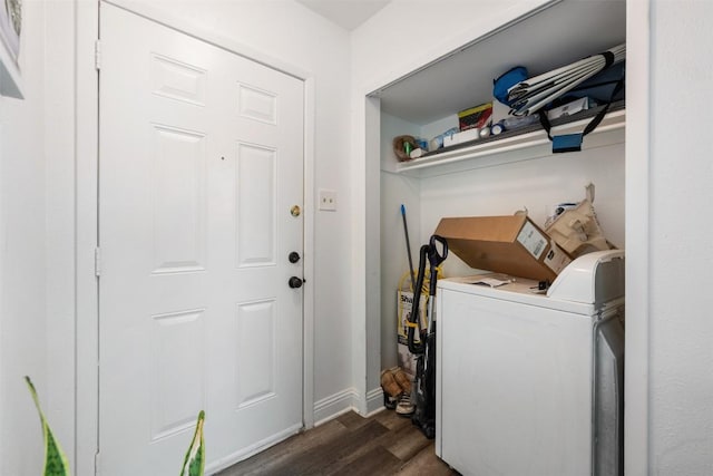 laundry area featuring dark wood-type flooring, washer / clothes dryer, baseboards, and laundry area