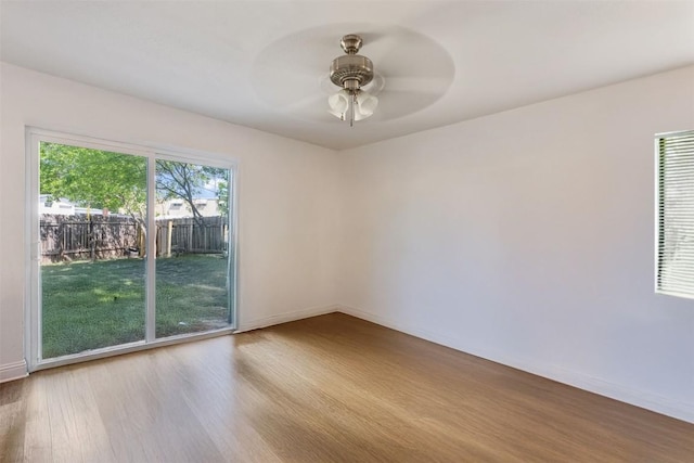 825 Ken St, Austin, TX 78758 - empty room with baseboards, a ceiling fan, and wood finished floors