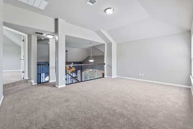 7817 Aria Loop, Austin, TX 78736 - additional living space with lofted ceiling, carpet flooring, and baseboards