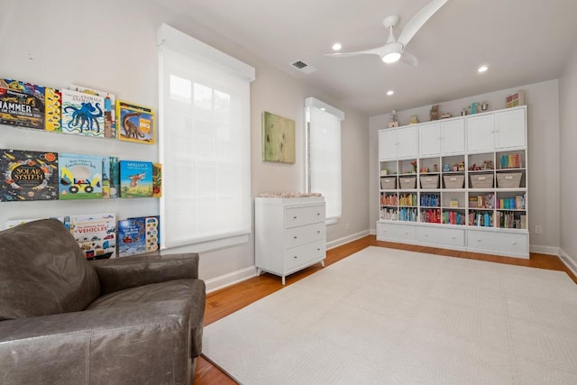 1307 Elton Ln, Austin, TX 78703 - living area featuring wood finished floors, recessed lighting, and a ceiling fan