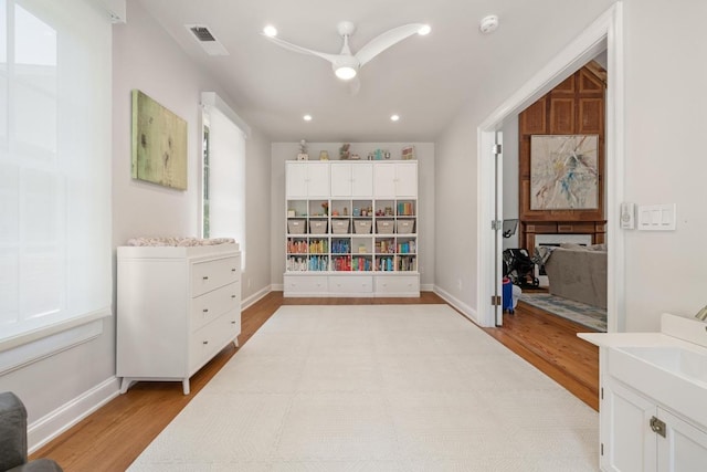 1307 Elton Ln, Austin, TX 78703 - living area featuring light wood-type flooring, recessed lighting, and ceiling fan